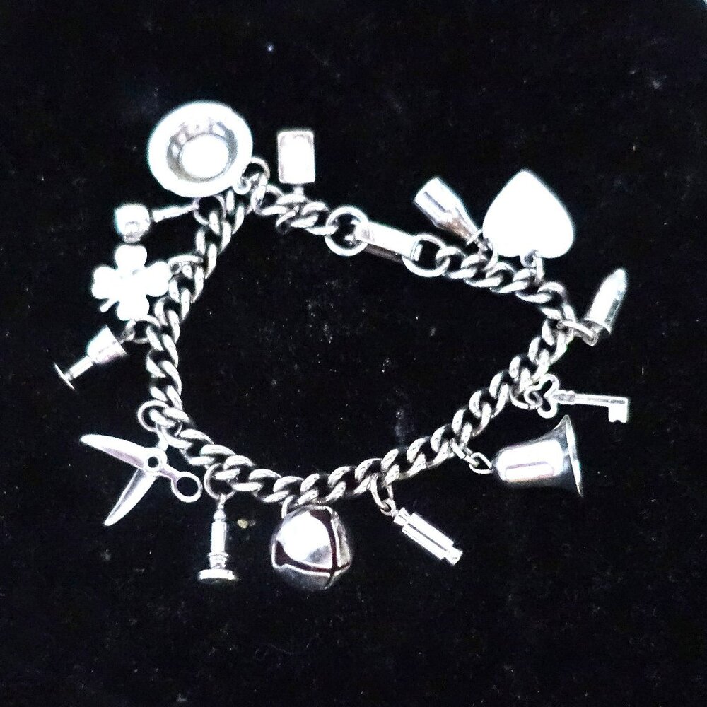 Silver tone Multi Charm Chain Bracelet
